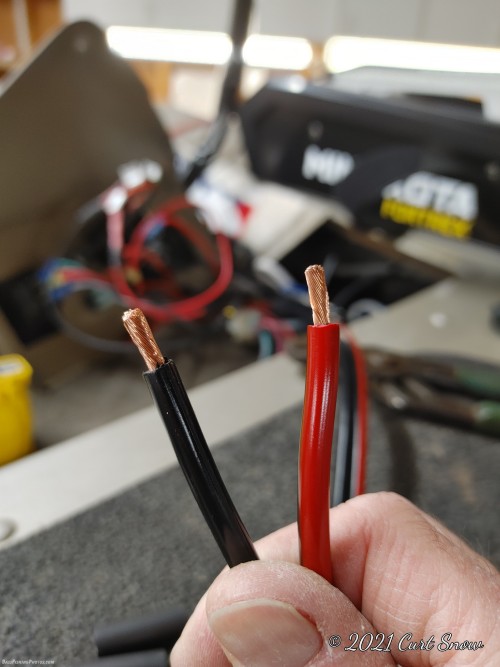 The first thing I did was cut off the terminals that came from the factory. They were too small for the wiring block in my boat.