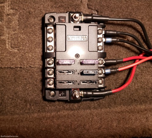 Wires for the USB ports are attached to the fuse panel.